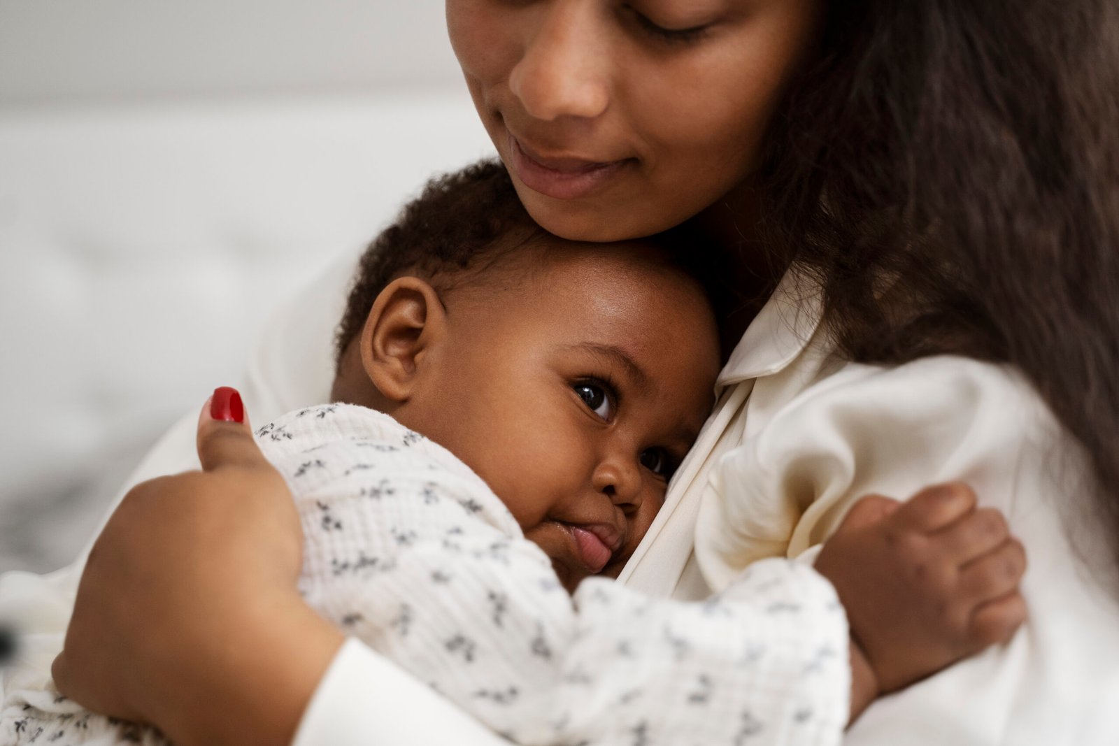 black mother taking car her child 1 scaled